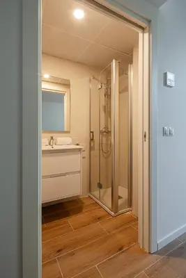 a bathroom with a shower and a sink at NEW DUPLEX, 2 WC, FRENTE CIUDAD DE LAS CIENCIAS Y LAS ARTES in Valencia
