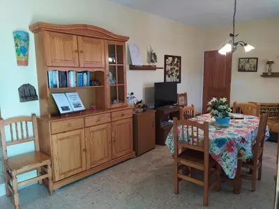 a bedroom with a bed and a window at La caseta del llorer in Catadau