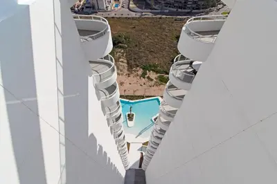 an aerial view of the infinity pool on a cruise ship at Global Vacacional, Apartamento con terraza y vistas al mar y a la montaña in Canet de Berenguer