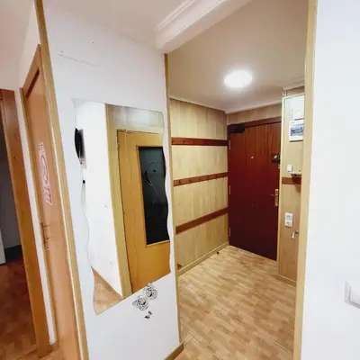 an empty room with a door and a hallway at Pintor 31 in Valencia
