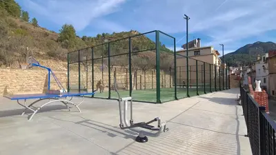 a basketball hoop on a building with a tennis court at La Viajera Espadan in Algimia de Almonacid
