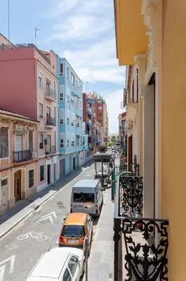 a view of a city street with cars and buildings at Casa Rosario Cabanyal flat near the beach, high end in Valencia