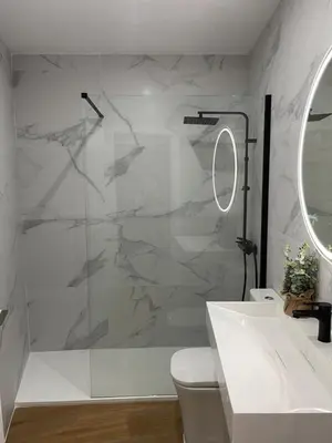 a bathroom with a shower and a toilet and a sink at UIM Mediterraneo PB Virgen del Carmen Wifi in Puerto de Sagunto