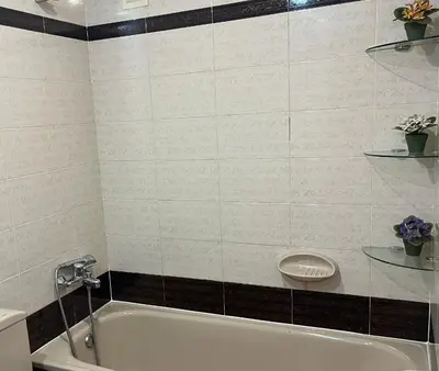 a bathroom with a white tub and a toilet at Borriana Bonica in Burriana