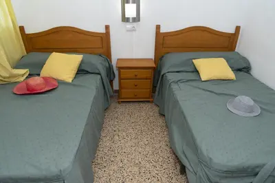 two beds sitting next to each other in a bedroom at Torremar, D-13-25 in Cullera