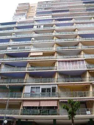 a tall apartment building with balconies on it at Torremar, D-13-25 in Cullera