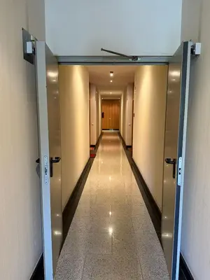 a hallway of an elevator in a building at Reinapart Patacona Beach 36 in Valencia