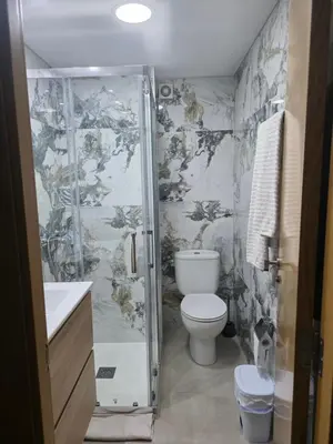 a bathroom with a shower and a toilet at Vivienda Particular Cerca de Valencia in Paterna