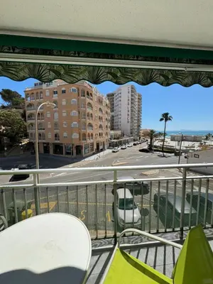a balcony with a view of a street and buildings at Encantador piso cerca de la playa en Cullera in Faro de Cullera