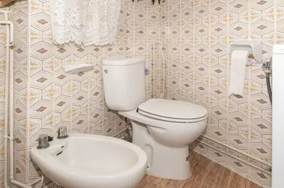 a bathroom with a toilet and a sink at GALEON, 10-75 Atico in Cullera
