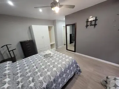 a bedroom with a bed with a stuffed animal on it at Precioso apartamento reformado con terraza, 4 habs in Valencia