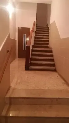 a staircase in a building with stairs leading up at City center where Falla starts in Valencia