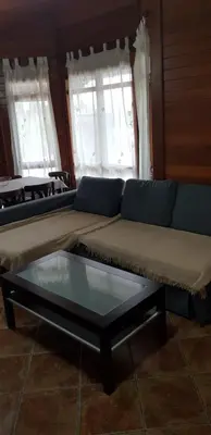 a living room with a couch and a coffee table at LA TRAMUNTANA CULLERA Playa Marenyet a 300 metros in Valencia
