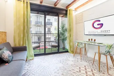 a living room with a couch and a table at LOFT RUZAFA PLUS in Valencia