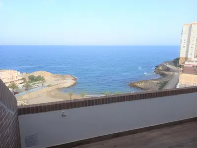 a view of the ocean from the balcony of a building at Faromar, I-10-M in Cullera