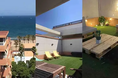 a house with a view of the ocean at Valencia Ático playa Patacona. Parking incluido in Valencia