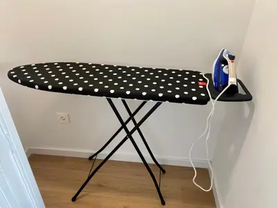 a black table with white polka dots on it at VerdeMar 5 (Playa Puerto de Sagunto) in Puerto de Sagunto