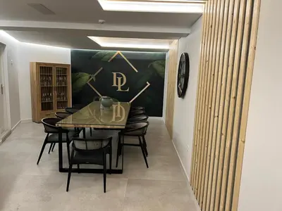 a dining room with a table and chairs at DON LEONE Hotel in Alginet