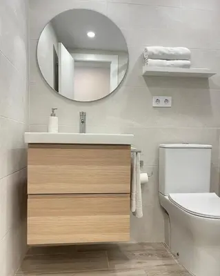 a bathroom with a sink and a mirror at NUEVO, a 60 metros de la playa y con vistas laterales al mar in Cullera