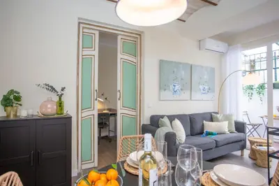 a living room with a couch and a table at SingularStays San Valero in Valencia