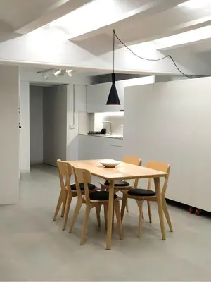 a dining room with a wooden table and chairs at Estudio Pino en casco antiguo VALENCIAYOLE in Valencia