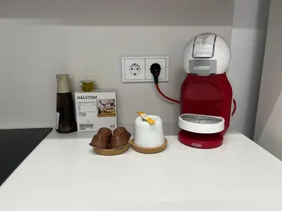 a kitchen counter with a coffee maker and a candle at Estudio Pino en casco antiguo VALENCIAYOLE in Valencia