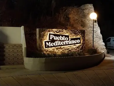 a sign for a mediterranean at Apartamentos Bon Amb in Faro de Cullera