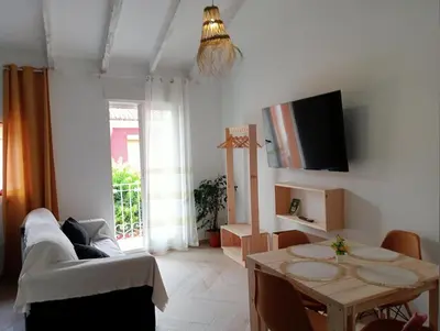a living room with a couch and a table at Loft C El Ramellet in Alginet