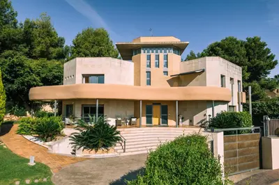 a house with a tower on top of it at Lushville - Luxurious Villa with Pool in Valencia in Campo Olivar