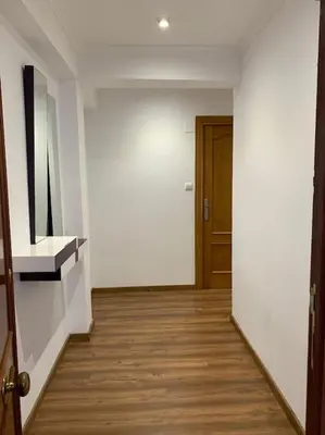 an empty room with a hallway with a door at Sueca 1 in Sueca