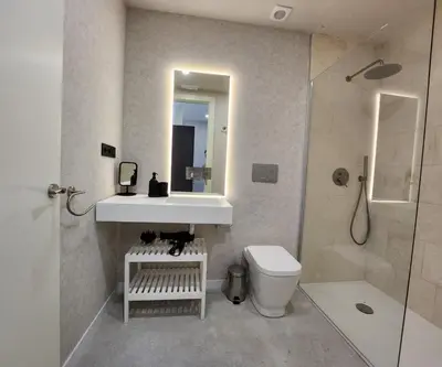 a bathroom with a sink and a toilet and a shower at MD Pare Presentat in Valencia