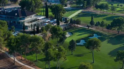 an aerial view of the golf course at a resort at Casa en Valencia, piscina, cerca de golf, playas, moto Gp in Valencia