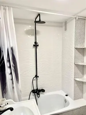 a bathroom with a shower and a sink at 3-bedroom apartment with terrace on ground floor in Moncófar