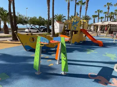 a playground in a park with a slide at 3-bedroom apartment with terrace on ground floor in Moncófar
