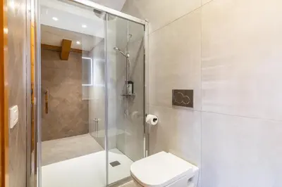 a bathroom with a shower and a toilet at Dolce Vita B&B - Only Adults in Valencia