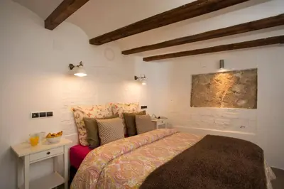 a bedroom with a bed in a room at Next to Central Market, Cathedral and Town Hall in Valencia
