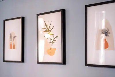 four framed pictures of plants on a wall at Classy Studio Apartment with Unique Design in Valencia