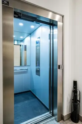 a glass elevator door in a building at Classy Studio Apartment with Unique Design in Valencia