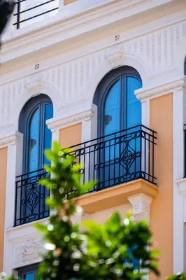 a building with blue windows and a balcony at Classy Studio Apartment with Unique Design in Valencia