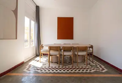 a dining room with a table and chairs at VLC Host - Cubells Apartments in Valencia