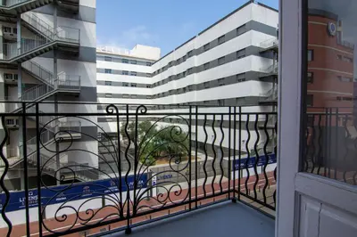 a balcony with a view of a building at VLC Host - Cubells Apartments in Valencia