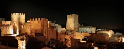 a view of a city at night with tall buildings at LA TRAVIATA - Buñol in Buñol