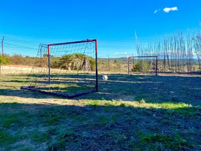 two goal nets sitting in a field at Beautiful Villa with huge private pool and vineyard view in Valencia