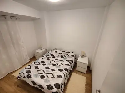 a bedroom with a bed and two night stands at Near Beach Cullera in Cullera
