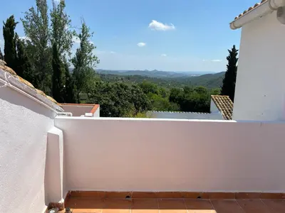 a white wall with a view of the mountains at La Andana in Macastre