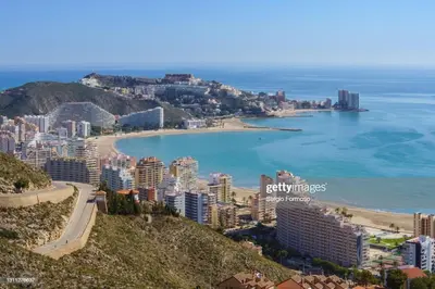 a view of the city and beach at NUEVO, a 80 metros del mar y la playa in Cullera
