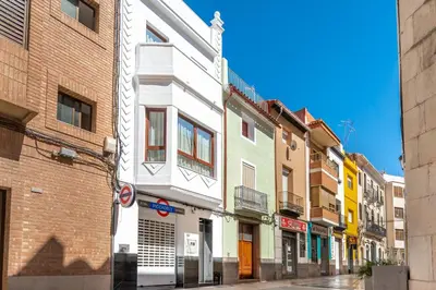 a street in a city with buildings at Vilamercat in Sueca