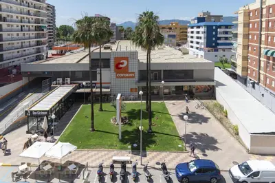 an overhead view of a shopping center in a city at Solimar, 4-8 in Cullera