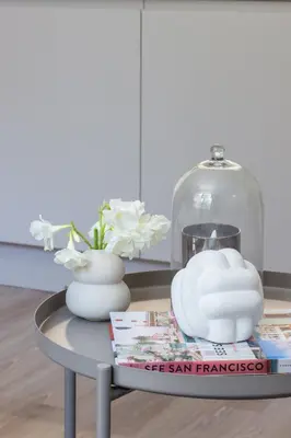 a table with a glass jar and vases on it at VLC HOST - Reino in Valencia