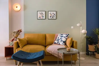 a living room with a couch and a table at Park Central loft. Ruzzafa. in Valencia